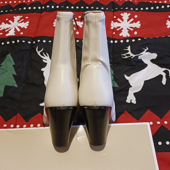 Michael Kors Dover Heeled Booties - Picture 8 of 13